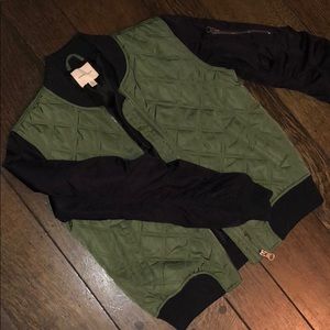 Green and black bomber jacket